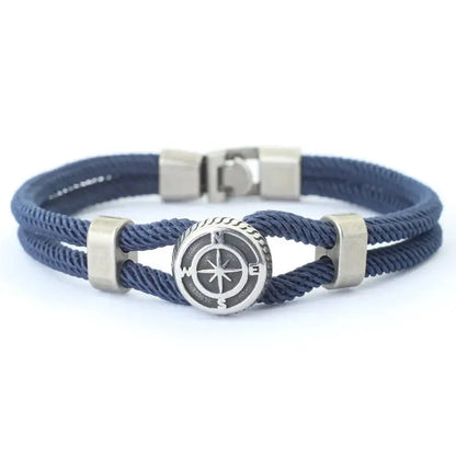 Navy double-strand rope bracelet with a silver-tone compass charm