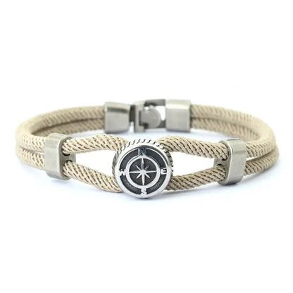 Khaki double-strand rope bracelet with a silver-tone compass charm