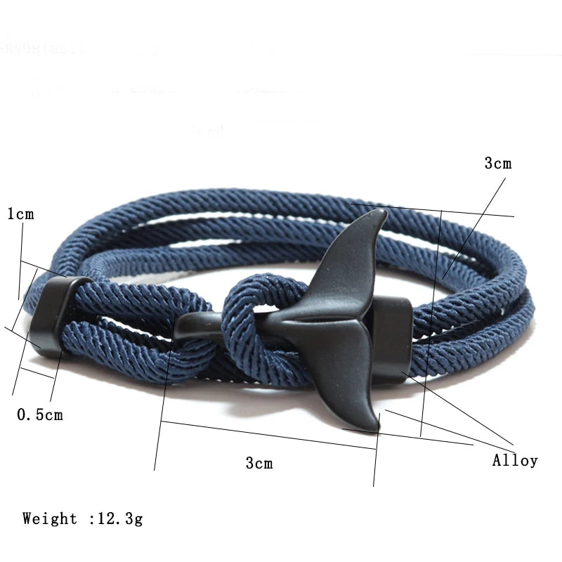 Diagram showing the whale tail charm dimensions and 12.3g weight of a navy rope bracelet