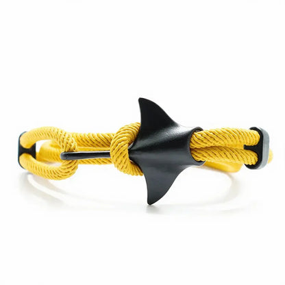 Manta ray charm in black finish on a yellow rope bracelet