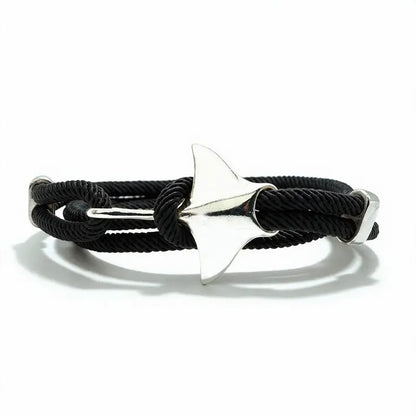 Manta ray charm in silver finish on a black rope bracelet