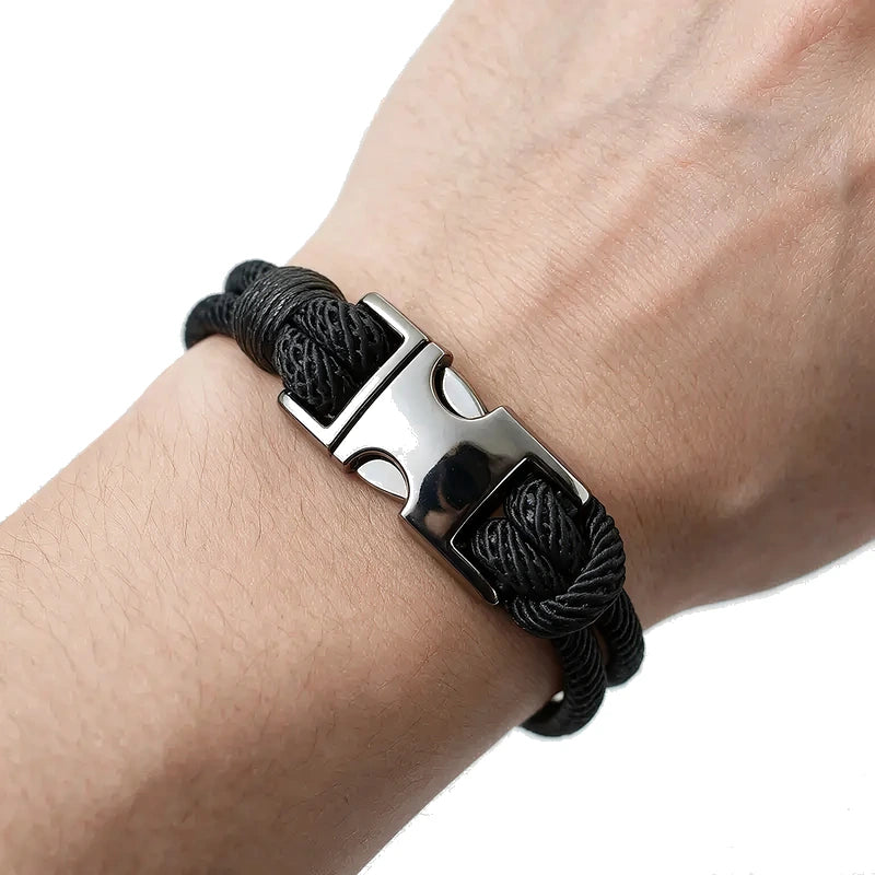 Rigger Spring Buckle Rope Bracelet, black rope with silver buckle clasp, worn on wrist