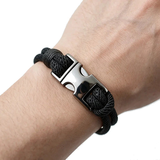 Rigger Spring Buckle Rope Bracelet, black rope with silver buckle clasp, worn on wrist