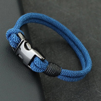 Baby blue double-strand rope bracelet with a gunmetal spring-loaded buckle clasp