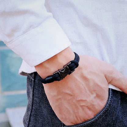 Black spring buckle rope bracelet worn on the wrist