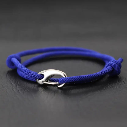 Dark blue nylon rope bracelet double-wrapped with a curved metal hook clasp