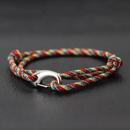 Multicolor rainbow nylon rope bracelet double-wrapped with a curved metal hook clasp