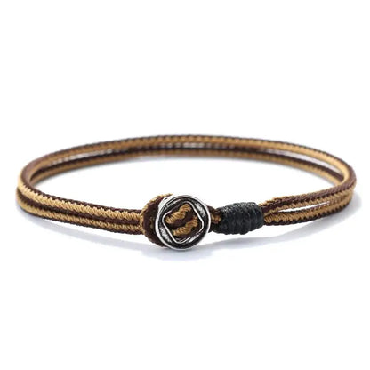 Khaki and black two-tone woven cord bracelet with a silver toggle bead