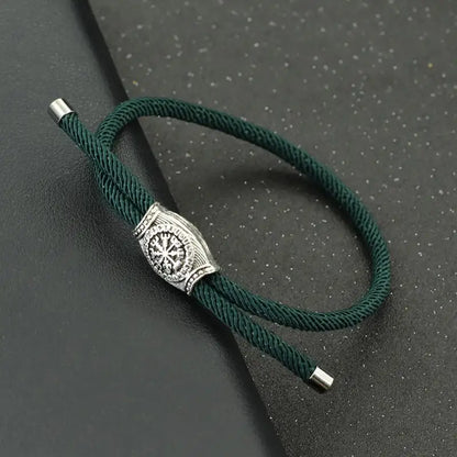 Green double-strand rope bracelet with an alloy Vegvisir rune bead