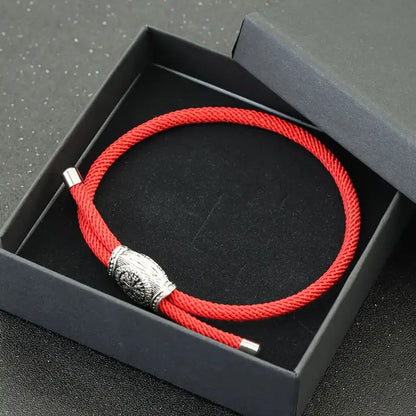 Red Vegvisir rune bracelet displayed in a gift box