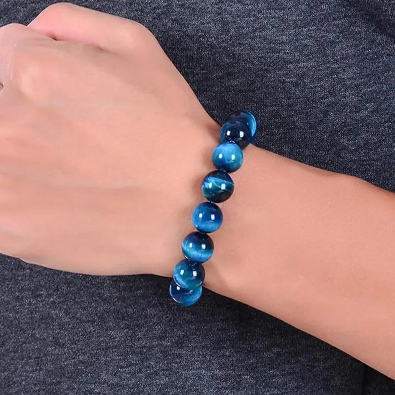 Abyss Blue Tiger Eye bracelet worn on the wrist