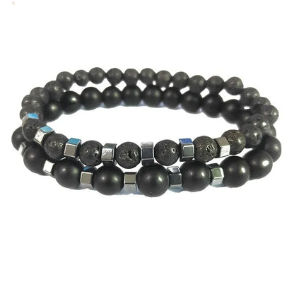 Lava rock and matte onyx beads with polished hematite spacers, angled studio shot
