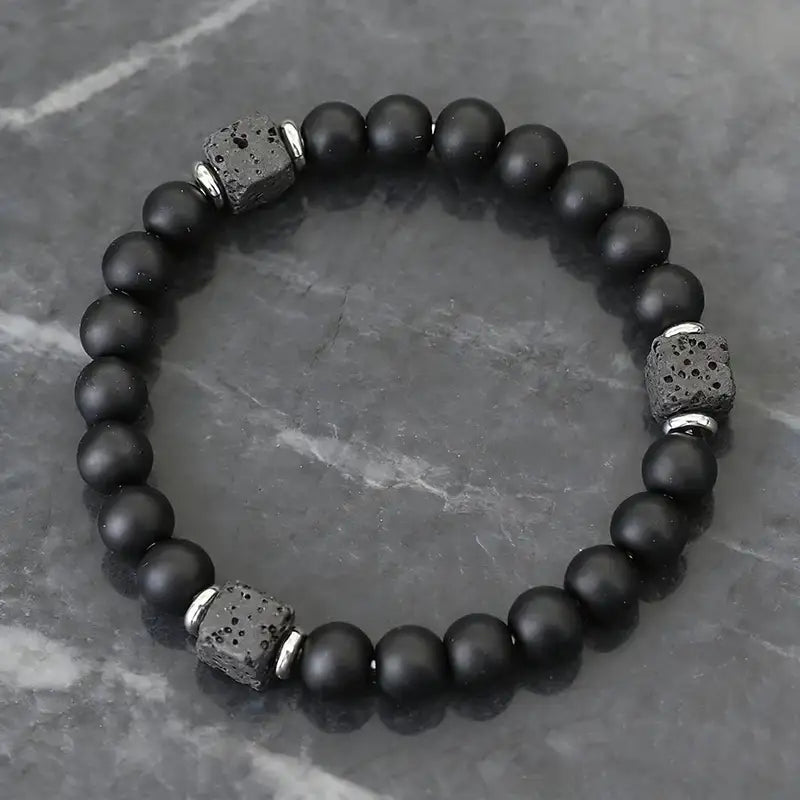 Matte onyx bead bracelet with silver spacer cubes