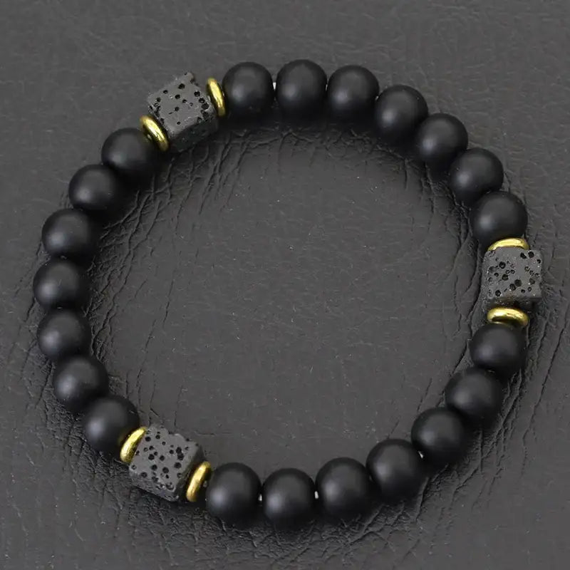 Flash stone bead bracelet with gold spacer cubes, labradorite-style sheen