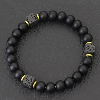 Flash stone bead bracelet with gold spacer cubes, labradorite-style sheen