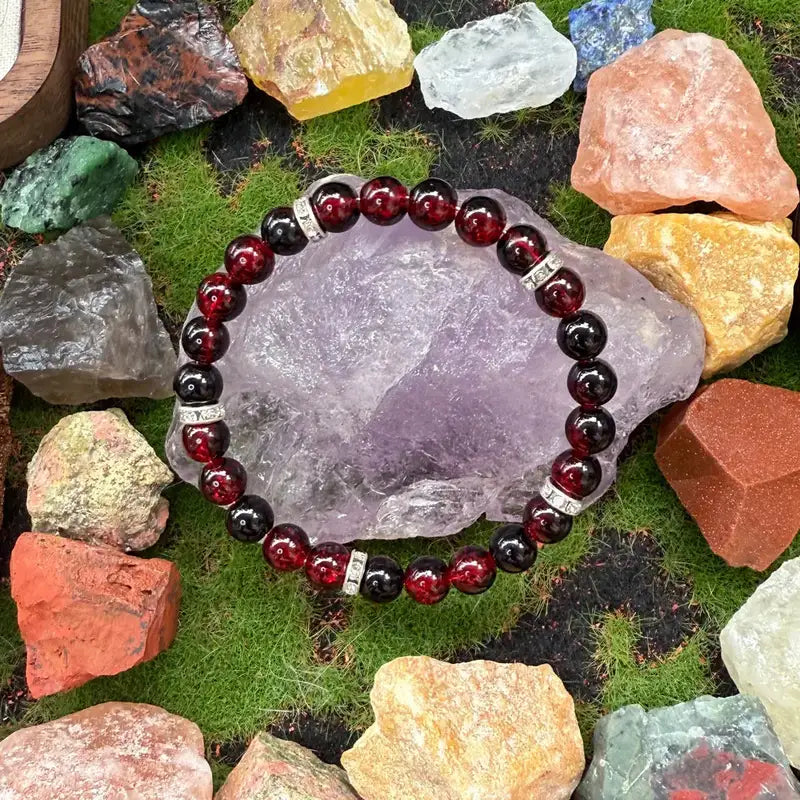 Haven Crackle Glass Bead Bracelet displayed with natural stones