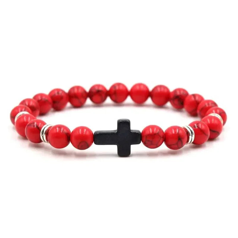 Red howlite bead bracelet with a small black cross bead and silver spacers
