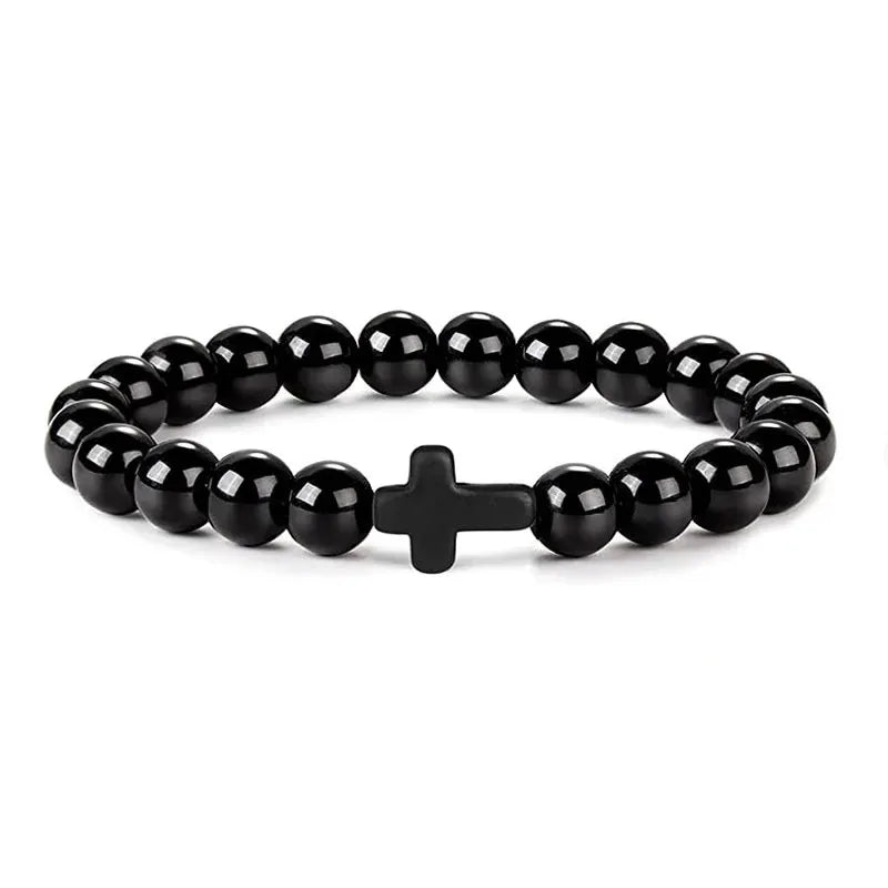 Polished black onyx bead bracelet with a matching black cross bead