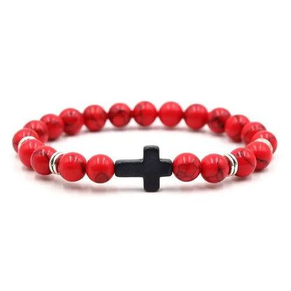 Red howlite bead bracelet with a small black cross bead and silver spacers