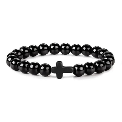 Polished black onyx bead bracelet with a matching black cross bead