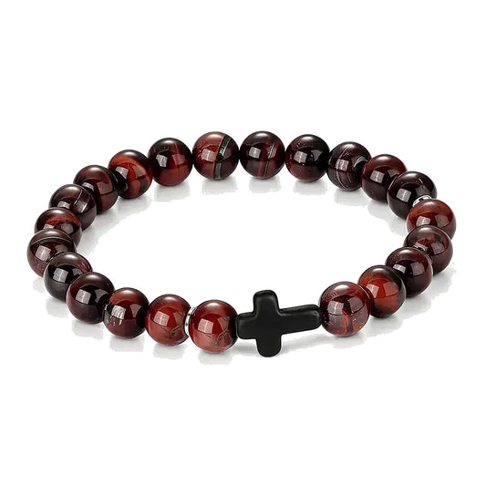 Red tiger eye bead bracelet with a black cross accent bead, on a white background.
