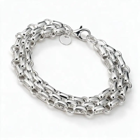 925 sterling silver chunky woven box-link chain bracelet with a round tag, product photo on white background