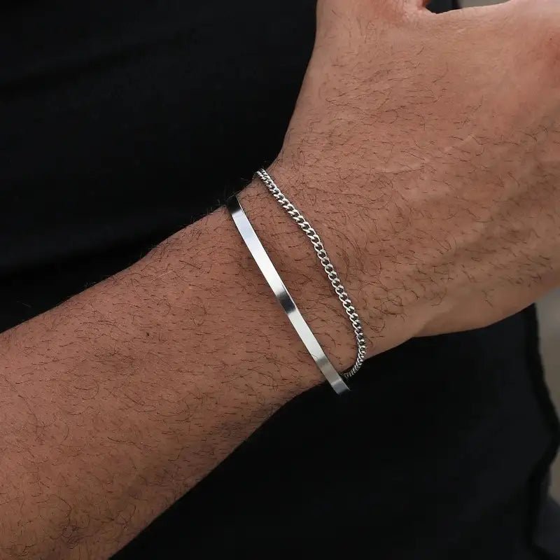 Silver curb chain and flat bar bracelet joined in one piece, worn on the wrist