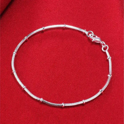 925 sterling silver thin snake chain bracelet with polished bead stations