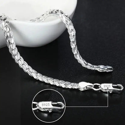 925 sterling silver thin flat herringbone chain bracelet with a lobster clasp