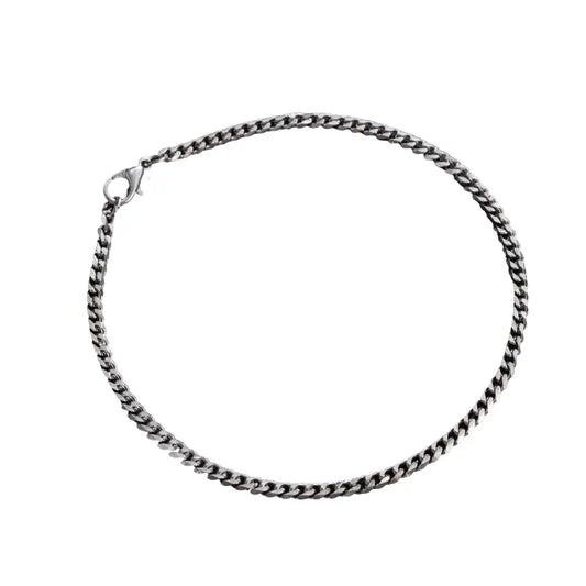 Silver Cuban link chain bracelet in 3mm width, product photo on white background
