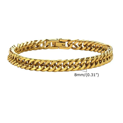 8mm gold-tone stainless steel Cuban link bracelet with a fold-over box clasp, laid flat in a circle