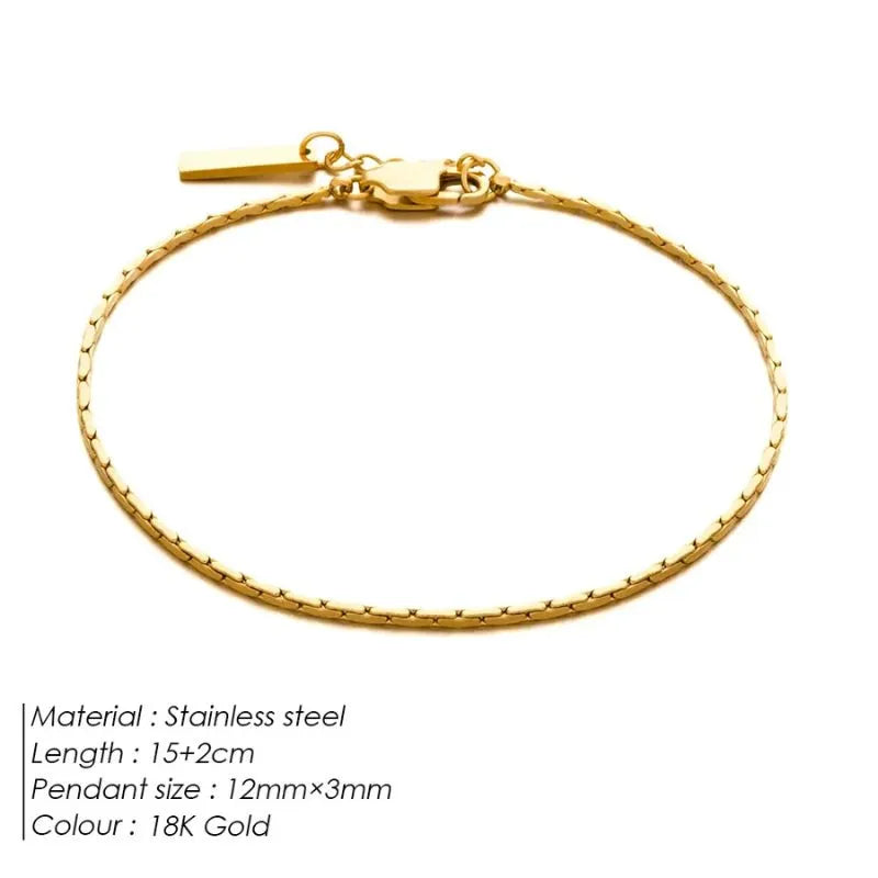 Gold wire chain bracelet laid flat on a white background, labeled Stainless steel, 15+2cm length, 12mm×3mm pendant size, 18K Gold colour.