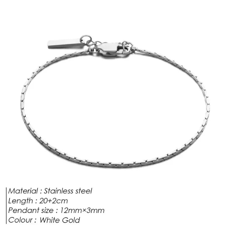 White gold-tone wire chain bracelet laid flat on a white background, labeled Stainless steel, 20+2cm length, 12mm×3mm pendant size, White Gold colour.