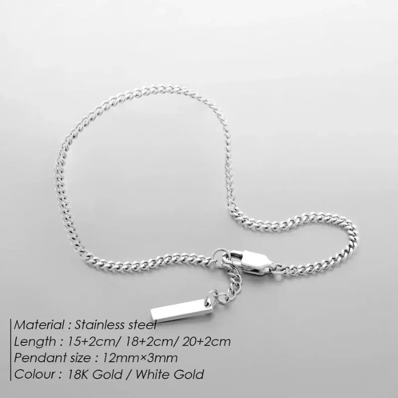 Silver curb chain bracelet laid flat, labelled with stainless steel material, length options 15+2/18+2/20+2cm, and 12mm x 3mm pendant size