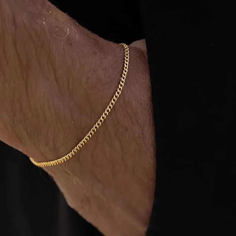 Men's Bracelet Gold with a lightweight Cuban link chain crafted from durable stainless steel.