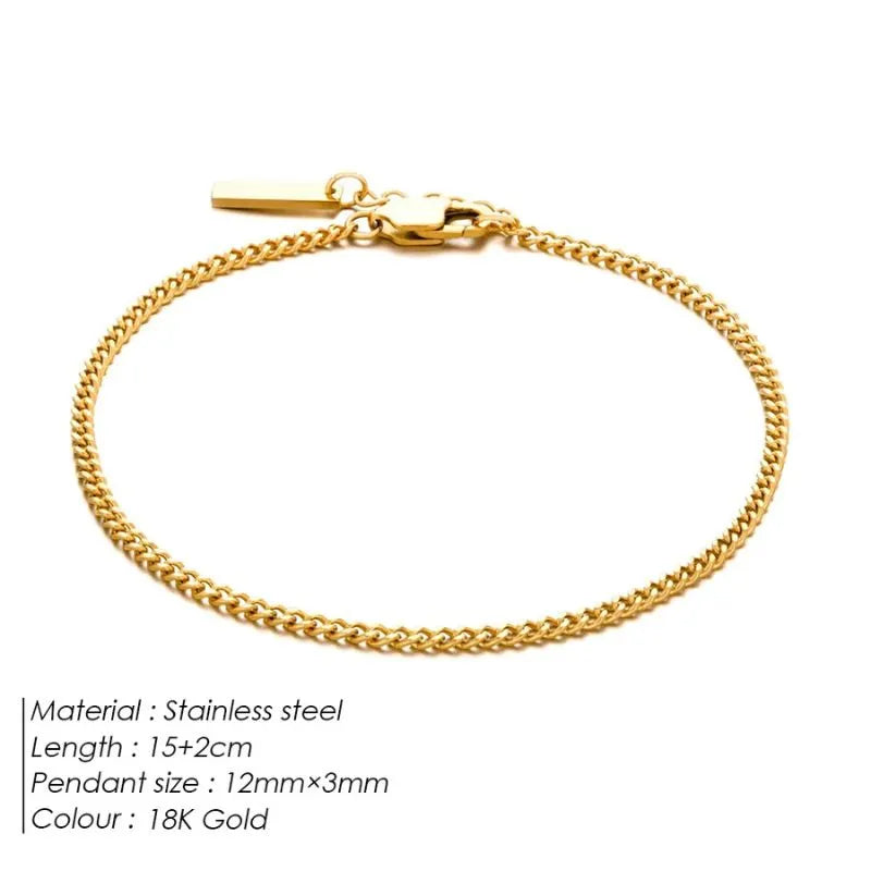 18K gold curb chain bracelet with labelled specifications: stainless steel, 15+2cm length, 12mm x 3mm pendant