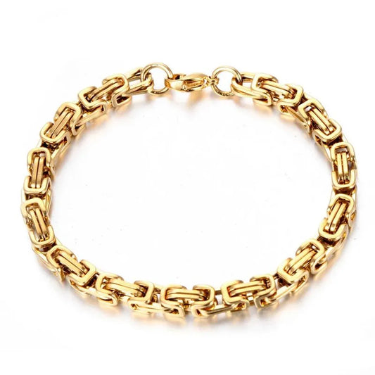Gold Byzantine box-chain bracelet laid flat in a circle on a plain white background.