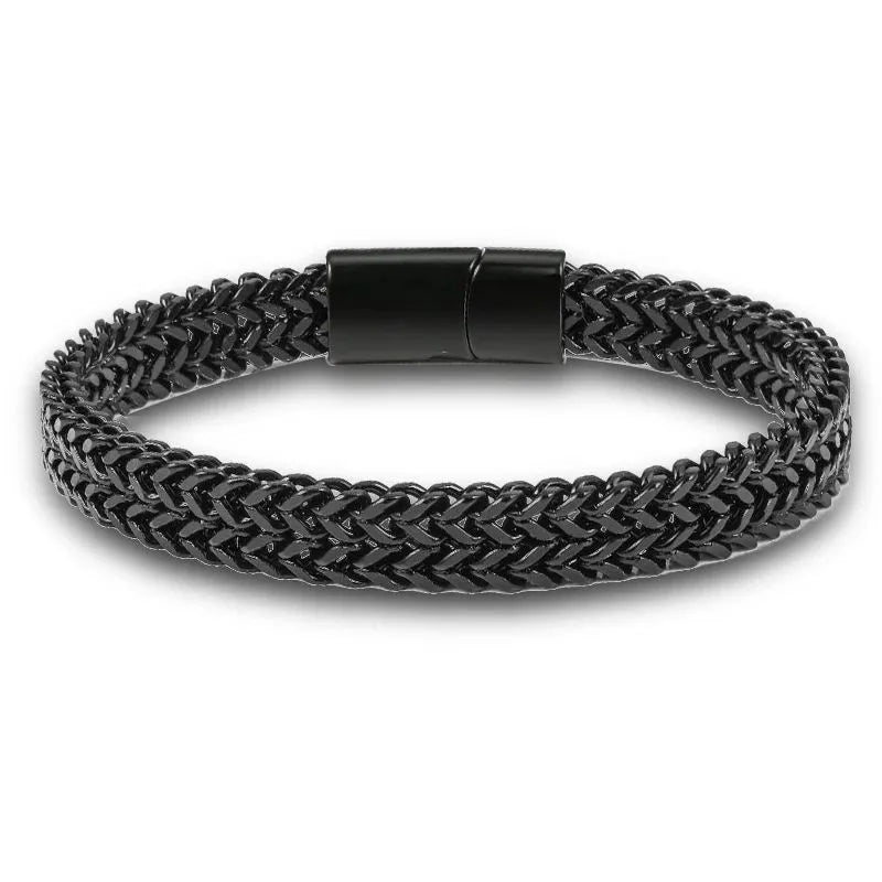 Black wheat link chain bracelet standing on a plain white background
