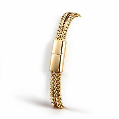 Gold wheat link chain bracelet with a magnetic push clasp, on a plain white background.