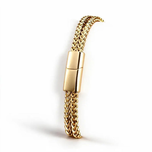 Gold wheat link chain bracelet with a magnetic push clasp, on a plain white background.