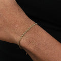 Elegant gold Cuban bracelet designed with durable stainless steel and a secure lobster clasp.