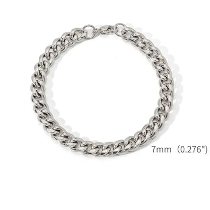 Silver-tone Cuban link bracelet laid flat in a circle on a white background, labeled with a 7mm (0.276") link width.