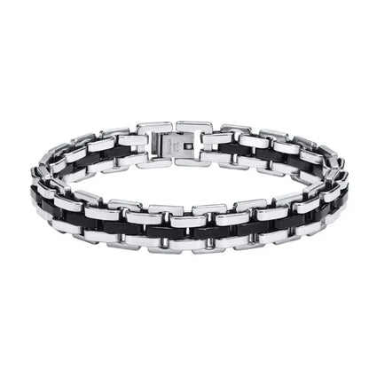Two-tone silver and black watchband-link bracelet laid in an oval on a plain white background.