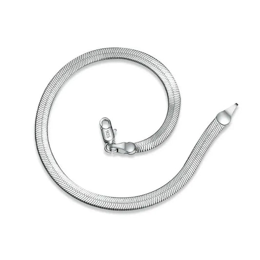 Silver flat blade chain bracelet coiled loosely on a white background, with a '925' stamp visible on the clasp.