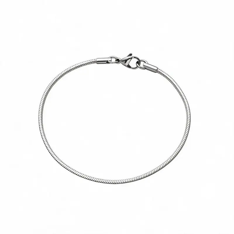 Silver thin snake chain bracelet with a lobster clasp, on a plain white background.