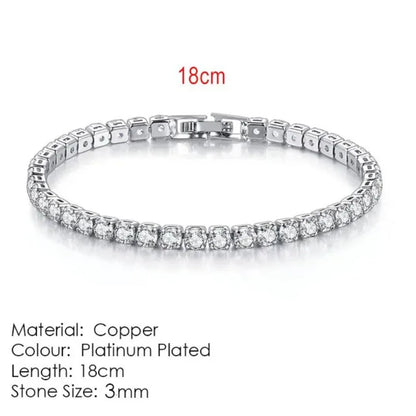 Silver tennis bracelet laid flat on a white background, labeled 18cm length, Material: Copper, Colour: Platinum Plated, Stone Size: 3mm.