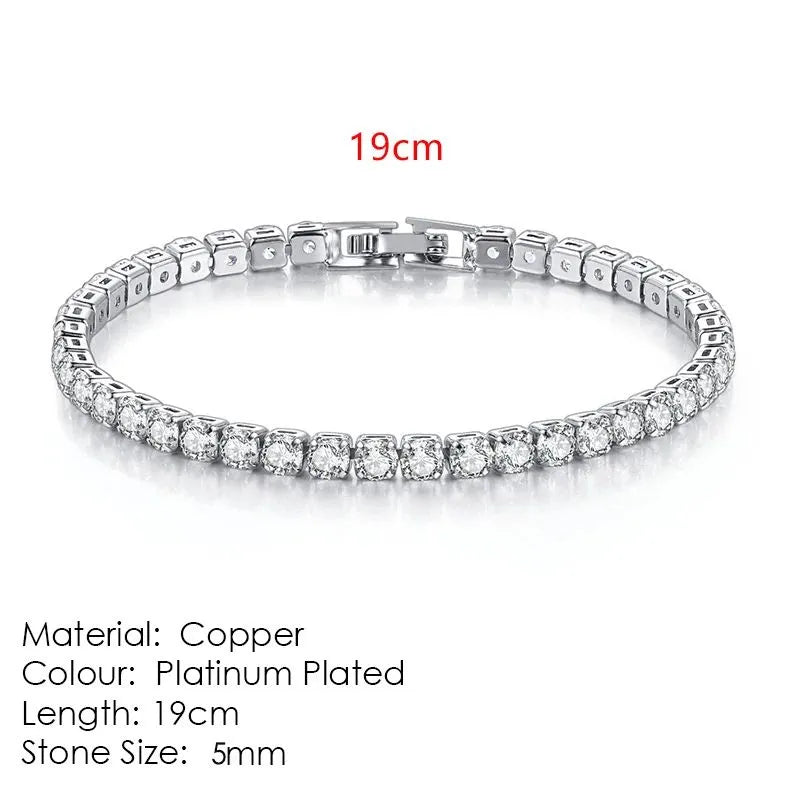 Silver tennis bracelet laid flat on a white background, labeled 19cm length, Material: Copper, Colour: Platinum Plated, Stone Size: 5mm.