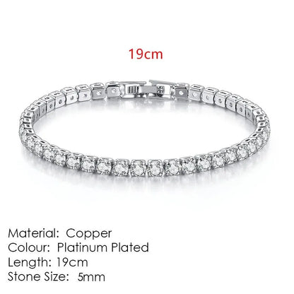 Silver tennis bracelet laid flat on a white background, labeled 19cm length, Material: Copper, Colour: Platinum Plated, Stone Size: 5mm.