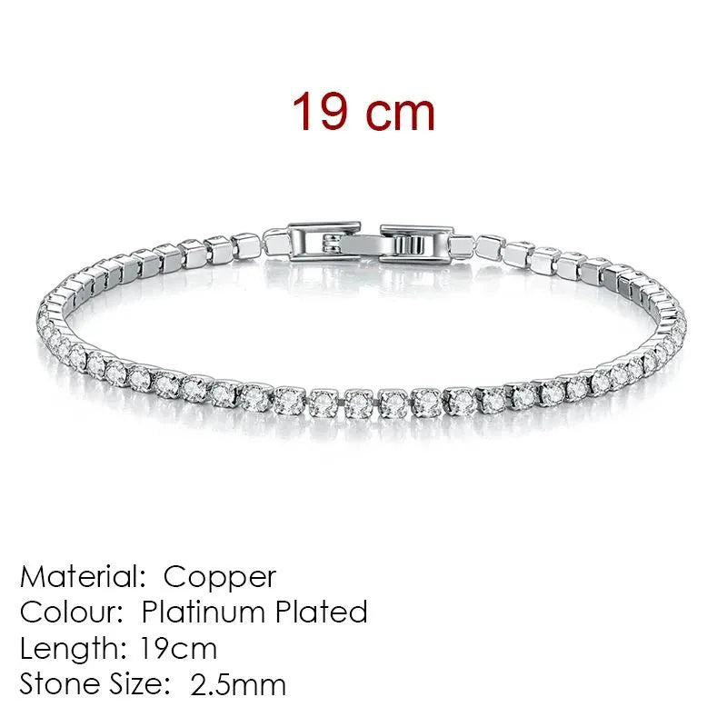 Silver tennis bracelet laid flat on a white background, labeled 19cm length, Material: Copper, Colour: Platinum Plated, Stone Size: 2.5mm.