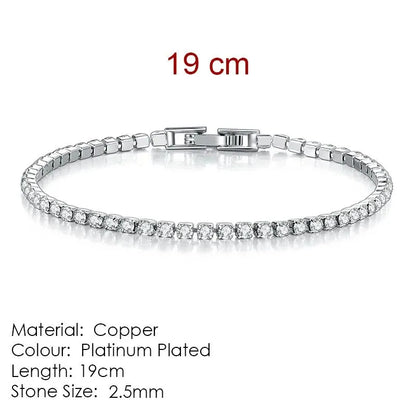 Silver tennis bracelet laid flat on a white background, labeled 19cm length, Material: Copper, Colour: Platinum Plated, Stone Size: 2.5mm.